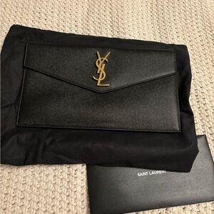 YSL authentic clutch black w gold logo approx 10.5x6 inches
